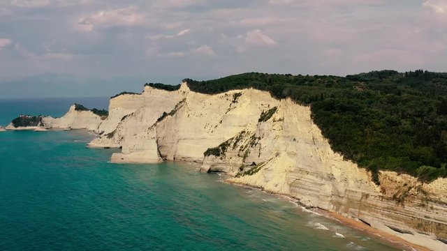 Wide Aerial View Of Logas beach cliffs in Peroulades, Geece