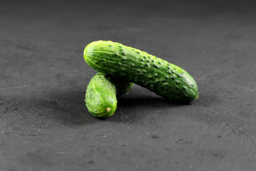 fresh cucumber on gray background