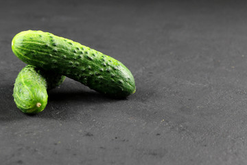fresh cucumber on gray background