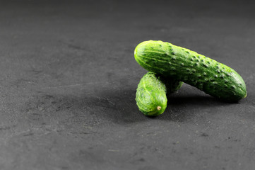 fresh cucumber on gray background