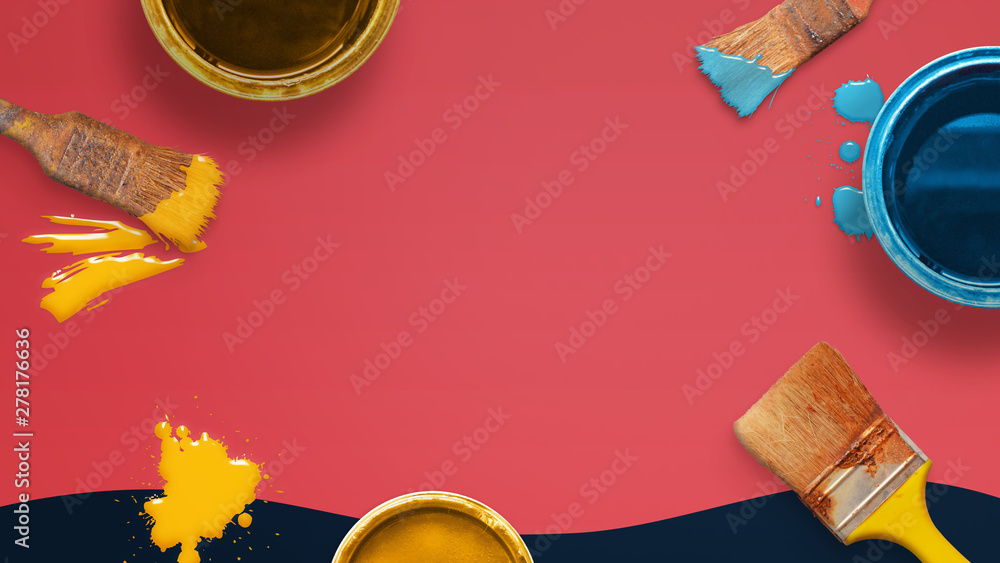 Poster Brushes and color boxes on red desk. DIY concept with copy space in the middle for text. Painting craft composition.