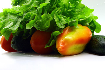 Fresh and healthy vegetables on white background
