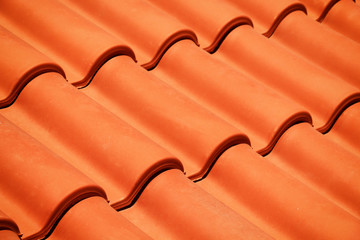 new red roof tiles closeup