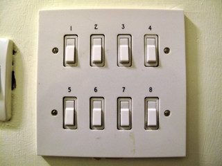 Retro numbered light switches in an old school building