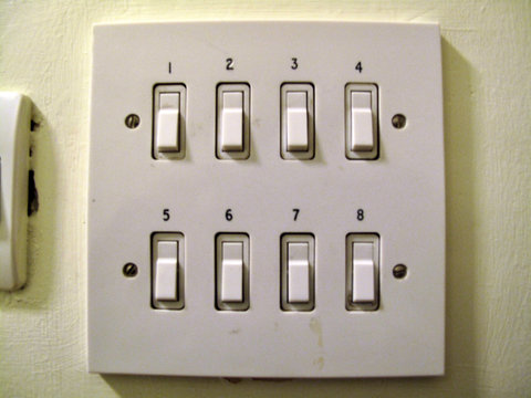 Retro numbered light switches in an old school building