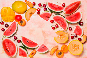 Various summer fruits background copy space.