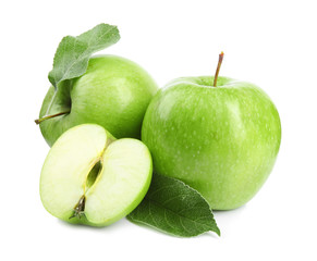 Fresh ripe green apples with leaves on white background