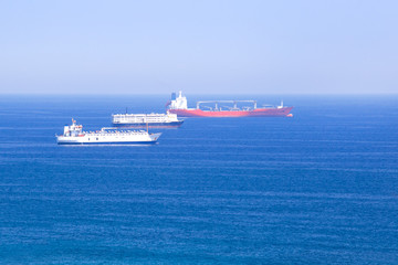 Fototapeta na wymiar Cargo ships in the Mediterranean sea, container , shipping , logistics , transportation Systems