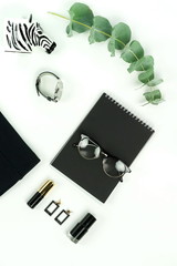 Flat lay collage of female style accessories sunglasses, make up tools, notebook top view on white background . 