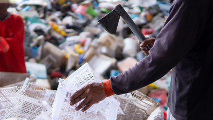 Workers are sorting plastic waste in the garbage factory