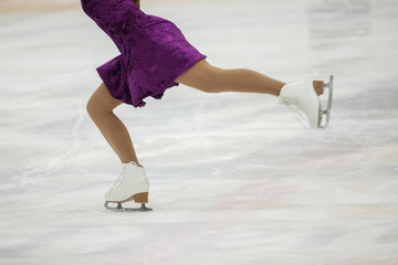 Figure skating, ice skating training. Feet skater on the ice
