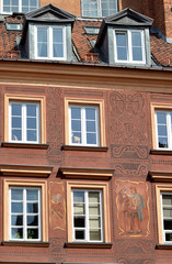 Ornately decorated burgher houses in Warsaw Old Town, Poland