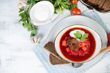 Traditional Ukrainian borsch with beef and sour cream
