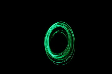 Long exposure photograph, light painting photography.  Letter o of an alphabet series, single...