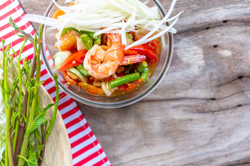 top view on Thailand most popular menu set of Somtum or spicy papaya salad  on wood table top