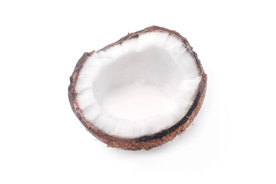 coconut half isolated on white background with milk