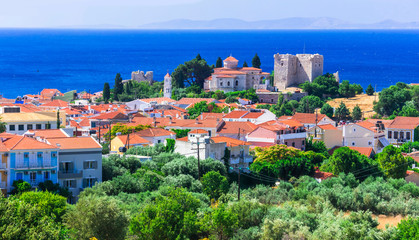 Fototapeta premium Landmarks of Samos islan - Pythagorion town, view with Lykourgos Logothetis castle. Greece