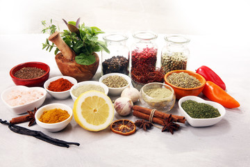 Spices and herbs on table. Food and cuisine ingredients with basil