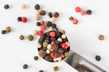 Peppercorns Spilled from a Teaspoon