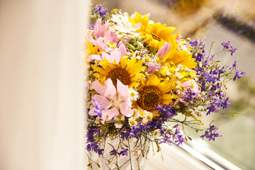 wildflowers in a vase - a stylish birthday bouquet. romantic content. holiday card