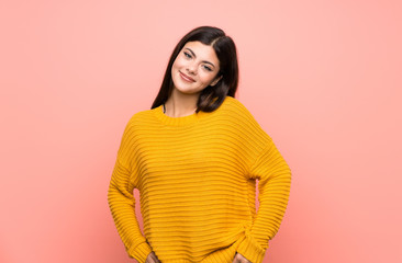 Obraz premium Teenager girl over isolated pink wall laughing