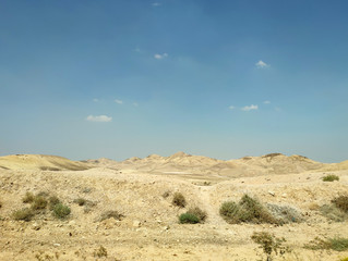 Desert land landscape with rocks, hills and mountains