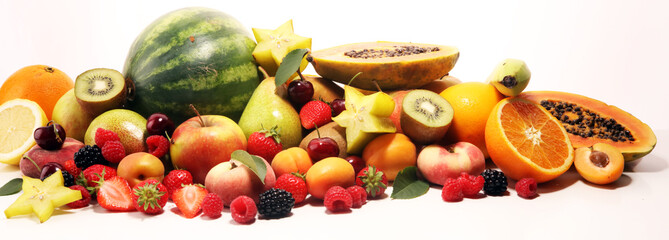 Fresh summer fruits with apple, peach, papaya, berries, pear and apricot.