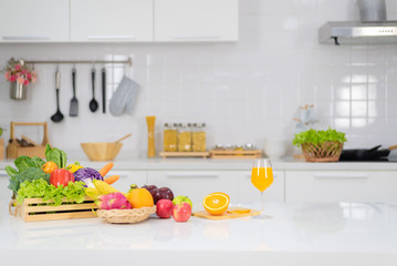Orange juice is placed on a white table, orange juice, bright colors placed on the table and the...