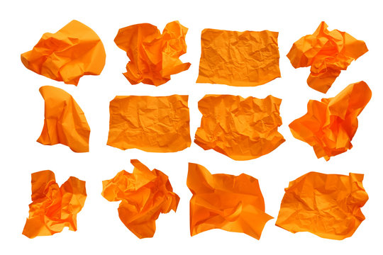 Close-up group of crumpled oranges paper isolated on a white background