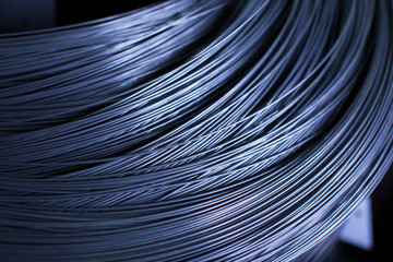Close up wire coil metal material texture for industrial background
