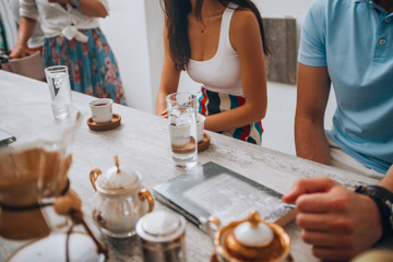 Obraz na płótnie Canvas Group of people enjoying in coffe restaurant