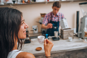 Cafe city lifestyle. Casual portrait of teenager girl sitting in coffee shop
