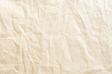 Old pale yellow crumpled paper background texture