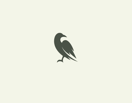 Logo icon silhouette of bird black raven in profile