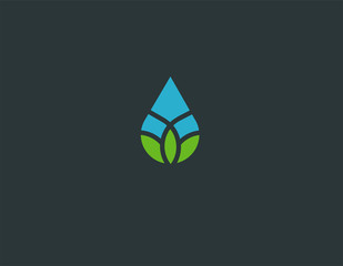 Abstract Creative Logo arrangement of blue and green color drop of water and flower for company