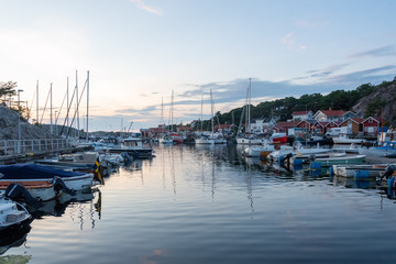 Fototapeta na wymiar Evening view of the small harbour of Resö, Western Sweden.