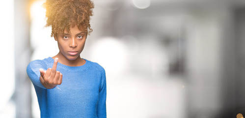 Beautiful young african american woman over isolated background Showing middle finger, impolite and...