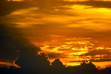 sunset back on last light red orange sky silhouette cloud