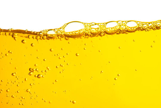 Oil car motor gasoline liquid yellow cemical with bubble isolated on white background