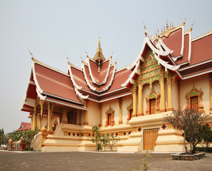 Naklejka premium Hor Thammasapha (Buddhist Convention Hall) of Wat That Luang Nuea (Nua) temple in Vientiane. Laos
