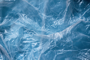 Clear plastic bag texture background. Waste recycling concept. Crumpled polyethylene and cellophane.