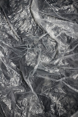 Clear plastic bag texture background. Waste recycling concept. Crumpled polyethylene and cellophane.