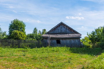 Obraz premium old wooden house in village