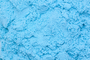 Fototapeta na wymiar Closeup og blue kinetic sand, background, texture.