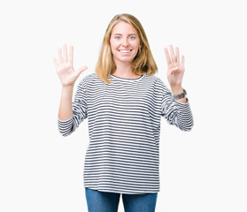 Fototapeta na wymiar Beautiful young woman wearing stripes sweater over isolated background showing and pointing up with fingers number nine while smiling confident and happy.