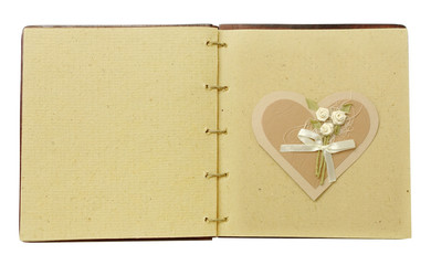 Vintage scrapbook album with heart design card. Wedding decoration.