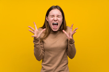 Young woman over colorful background unhappy and frustrated with something - Powered by Adobe