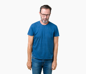 Handsome middle age hoary senior man wearin glasses over isolated background depressed and worry for distress, crying angry and afraid. Sad expression.