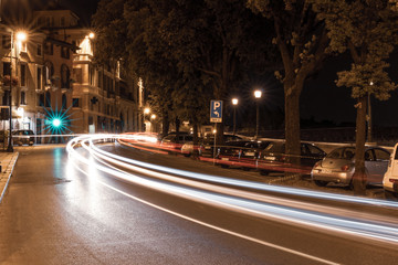 Fototapeta na wymiar Lights Cars in night city in verona Italy