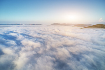 Aerial view white clouds in blue sky at morning.
